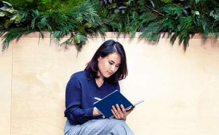 Woman sitting and reading